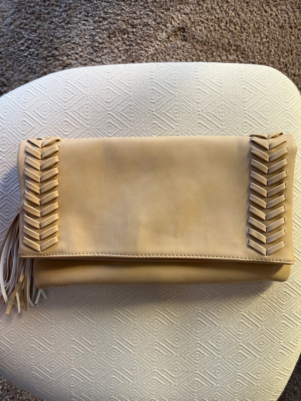 Faux leather clutch with tassel